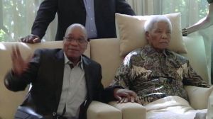 In this image taken from video, the ailing anti-apartheid icon Nelson Mandela is filmed Monday April 29, 2013, more than three weeks after being released from hospital. South African President Jacob Zuma visited the former leader on Monday, but Mandela does not appear to speak during the televised portion of the visit.